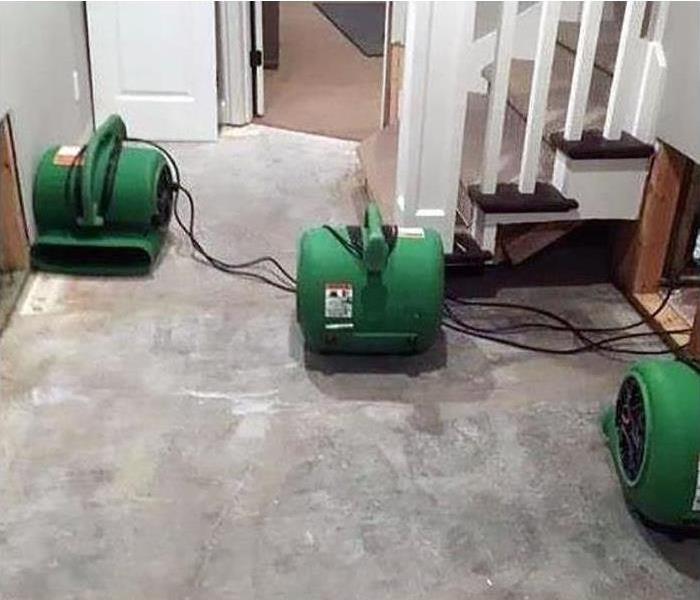 SERVPRO Drying Equipment Set Up On A Floor In A Home Drying The Floors