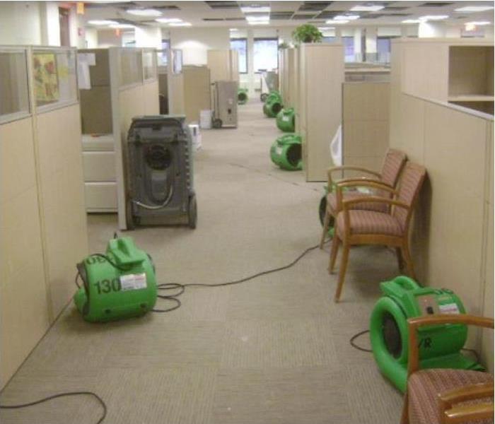 SERVPRO restoration equipment being used to dry inside of office
