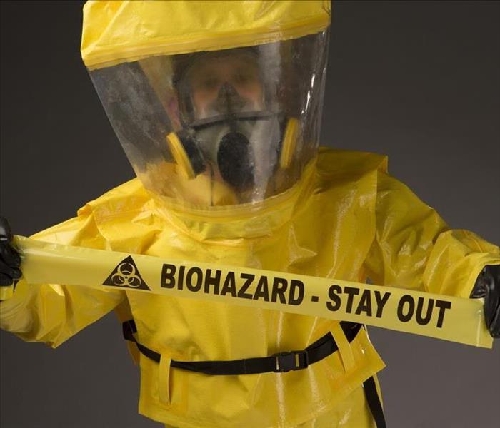 biohazard warning and suit
