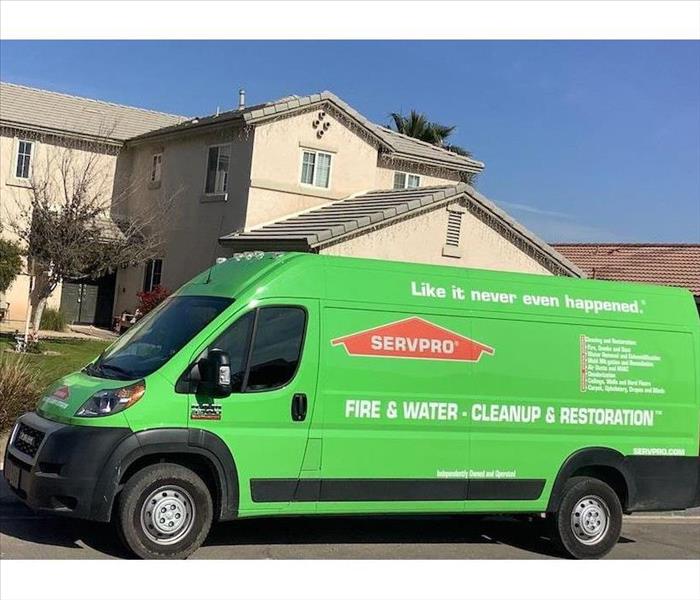 SERVPRO vehicle parked in front of home